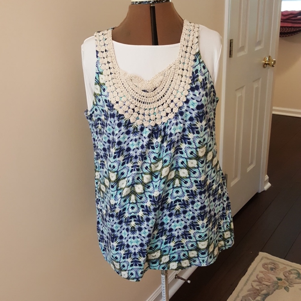 Blue and cream tank with crochet detail.